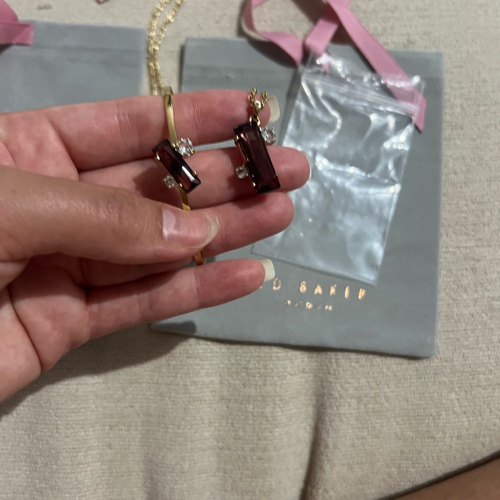 Ted Baker Gold and Dark purple Women's bracelet and necklace.
